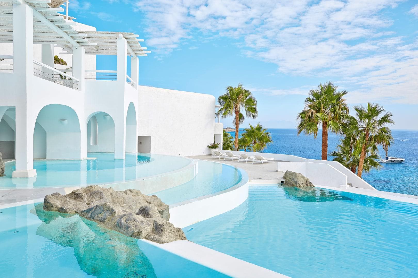 Ultiem genieten: 8 dagen Mykonos Blu Grecotel Resort voor €1200